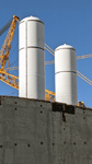 The twin solid rocket motors for Endeavour stand tall at the construction site for the future Samuel Oschin Air and Space Center in Los Angeles...on November 8, 2023.