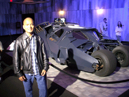 Posing with the Tumbler from BATMAN BEGINS and THE DARK KNIGHT, on December 7, 2012.