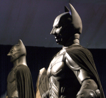 The Batsuits of THE DARK KNIGHT Trilogy on display at L.A. Live, on December 7, 2012.