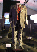 The Harvey Dent suit used by Aaron Eckhart in THE DARK KNIGHT, on display at L.A. Live on December 7, 2012.