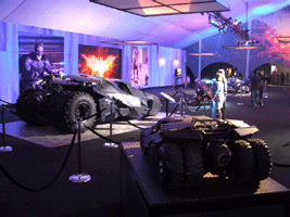 The real and miniature Tumbler from BATMAN BEGINS and THE DARK KNIGHT, on display at L.A. Live on December 7, 2012.