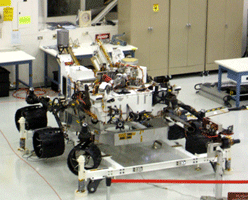 The real Curiosity rover on display inside the Spacecraft Assembly Facility.