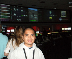 Posing inside the Space Flight Operations Facility.