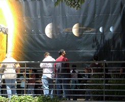 A large banner showing our solar system.