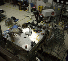 An engineering model of the Curiosity rover inside the In-Situ Instrument Laboratory.