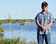 Posing with NASA's Space Launch System rocket behind me at Kennedy Space Center's Launch Complex 39B in Florida, on March 27, 2022