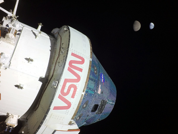 A selfie that NASA's Orion spacecraft took with the Moon and Earth in the distance...on November 28, 2022