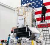 Lunar Outpost's MAPP rover and Intuitive Machines' Athena lunar lander on display during a media event at Cape Canaveral, Florida