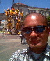 Posing with the life-size Bumblebee movie prop near Bronson Gate at Paramount Studios