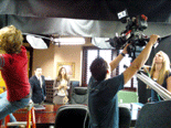 Noureen DeWulf and Eddie Jemison prepare to film another scene for COFFEE, KILL BOSS
