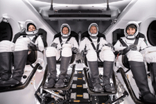 The four Crew-4 astronauts pose for a photo inside SpaceX's Crew Dragon Freedom capsule prior to launch, on April 27, 2022