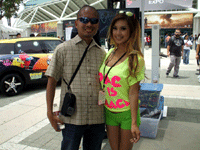Posing with a PAC-MAN booth girl at E3 2013 in downtown Los Angeles, on June 11, 2013