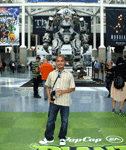 Posing with a large statue promoting the Xbox video game TITANFALL at E3 2013 in downtown Los Angeles...on June 11, 2013
