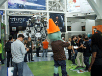 The costumed PLANTS VS. ZOMBIES dude and the TITANFALL statue at E3 2013 in downtown Los Angeles...on June 11, 2013