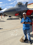 Posing with an F-22 Raptor during the Aerospace Valley Air Show at Edwards Air Force Base, California...on October 15, 2022.