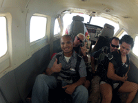 Kickin' back as the aircraft reaches jumping altitude above Lake Elsinore, CA...on October 4, 2014.