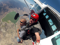 Exiting the aircraft for my tandem skydive above Lake Elsinore, CA...on October 4, 2014.