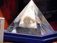 The Moon rock on display inside the JPL museum.