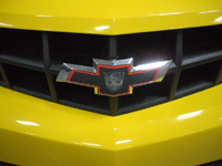 The Chevrolet and Autobot logos on the Camaro.