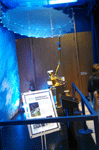 A miniature model of NASA's Soil Moisture Active Passive (SMAP) satellite on display inside JPL's Von Karman Auditorium, on September 8, 2014.