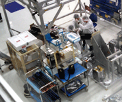 Engineers work on components for SMAP inside the SAF clean room at NASA JPL...on September 8, 2014.