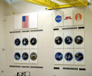 Emblems for past NASA JPL missions on a wall inside the SAF...on May 30, 2018.