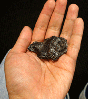 Holding a piece of meteorite!