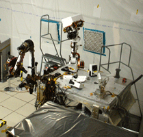 An engineering model of the Curiosity rover inside the In-Situ Instrument Laboratory.