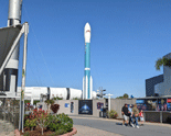 An unflown Delta II rocket stands tall at the Rocket Garden.