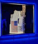 A remnant of the orbiter Challenger on display inside the Space Shuttle Atlantis Exhibit.
