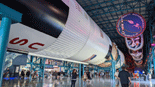 A low-angle view of the Saturn V rocket inside the Apollo/Saturn V Center.