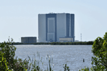 The Vehicle Assembly Building as seen from the Apollo/Saturn V Center across the Banana River.