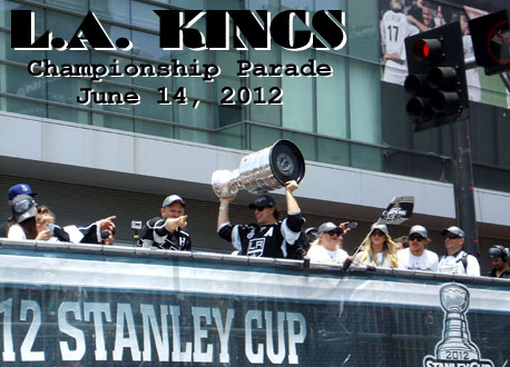 The Stanley Cup trophy is hoisted into the air by team center Anze Kopitar during the L.A. Kings' championship parade on June 14, 2012.