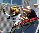 Bailey, the L.A. Kings' mascot, waves to the crowd during the Kings' 2014 championship parade