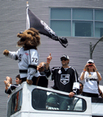 Bailey, the L.A. Kings' mascot, waves to the crowd during the Kings' 2012 championship parade
