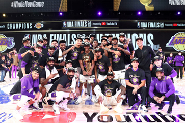 The Los Angeles Lakers take a group photo after winning their 17th franchise title in the 2020 NBA Finals
