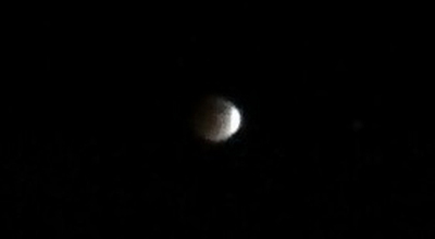 A smartphone photo that I took of the Moon as it was slowly concealed by Earth's shadow prior to the total lunar eclipse on April 15, 2014.
