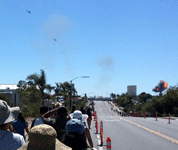 During a combat demo, two AH-1 Cobra attack helicopters fly towards an explosion at the Miramar Marine Corps Air Station (MCAS)...on September 24, 2016.