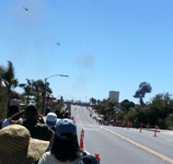 During a combat demo, two AH-1 Cobra attack helicopters fly towards an explosion at Miramar MCAS...on September 24, 2016.