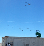 Flying above the V-22 Ospreys and the other helicopters are a C-130 Hercules cargo plane, two AV-8B Harrier II jump jets and a pair of F/A-18 Hornets...on September 24, 2016.