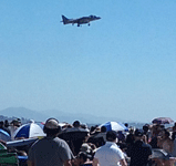 The crowd watches as an AV-8B Harrier II jump jet is about to conduct a vertical landing at Miramar MCAS...on September 24, 2016.