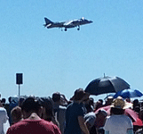 The crowd watches as the AV-8B Harrier II jump jet is about to conduct a vertical landing at Miramar MCAS...on September 24, 2016.