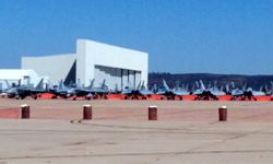 A squadron of F/A-18 Hornets is parked on the tarmac at Miramar MCAS...on September 24, 2016.