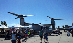 A V-22 Osprey (with an MQ-1 Predator drone behind it) on display at Miramar MCAS...on September 24, 2016.