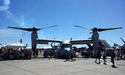 An air demo takes place behind the V-22 Osprey at Miramar MCAS...on September 24, 2016.