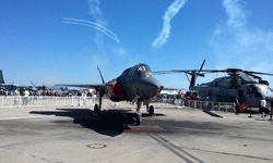 Another air demo takes place above the F-35B Lightning II and MH-53 Pave Low chopper at Miramar MCAS...on September 24, 2016.