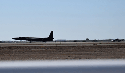 The U-2 Dragon Lady touches down on the runway...with a Ferrari chase car following behind it on September 29, 2018.