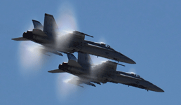 The two F/A-18s fly just below the speed of sound above MCAS Miramar...on September 29, 2018.