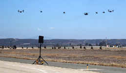 With Marine soldiers on the ground, the V-22 Ospreys, UH-1Y Venoms, AH-1 Cobras and CH-53 Sea Stallion fly above MCAS Miramar...on September 29, 2018.