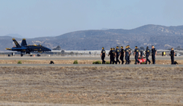 The Blue Angels' ground crew watches as the modified F/A-18s land at MCAS Miramar after their air demo...on September 29, 2018.
